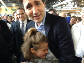 Illustration for article titled Little girl overwhelmed by meeting Justin Trudeau at Halifax Farmer's Market